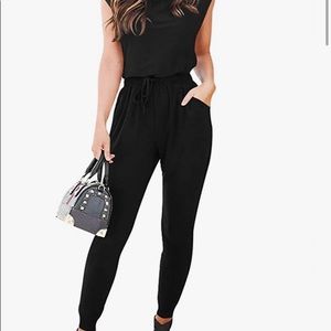 Woman’s Cap Sleeve crewneck high waist Jumpsuit w/ pockets Size Medium